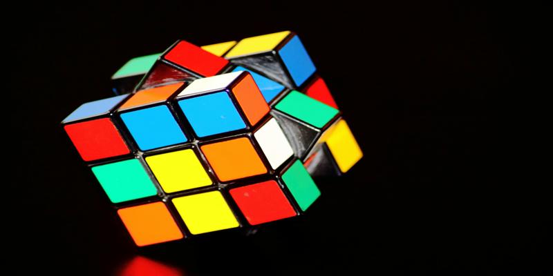 A close-up of a puzzle

Description automatically generated